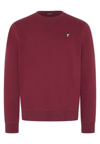 Sudadera marrón hecha de un tejido suave. Presenta un escote redondeado, puños de canalé y un pequeño logotipo verde en el pecho.
