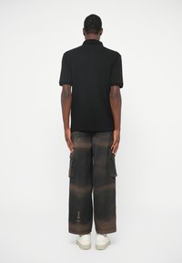 Armani Exchange UNISEX - Polosärk - black