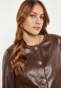 faina Giacca di pelle - braun