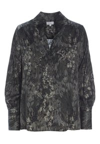 Blouse à manches longues de couleur vert foncé avec un motif de gris et de noir sourds. Dotée d'un col en V et de poignets froncés, texture soyeuse.