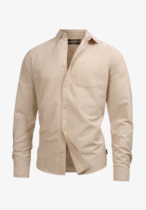 Beige long-sleeve shirt made of textured fabric. Features a button-down collar, front pocket, and seven buttons along the placket.