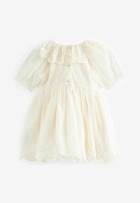 Robe blanche avec un col à volants, des manches bouffantes transparentes et un ourlet brodé. Confectionnée dans un tissu léger avec une jupe fluide.