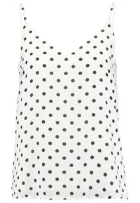 Haut blanc sans manches avec un décolleté en V, orné de pois noirs partout. Confectionné dans un tissu lisse à la texture légère et aérée.