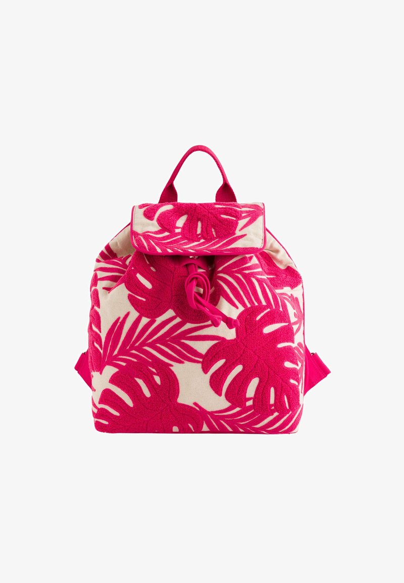 Multicolored backpack with a cream base and bright pink tropical leaf embroidery, featuring a flap closure and adjustable straps.