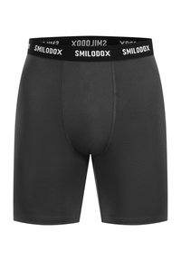 Sorte boxer shorts lavet af et glat, strækbart stof. Har en bred, mærket elastisk talje med "SMILODOX" i hvid tekst.