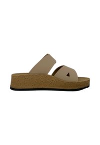 Sandali platform beige con due ampie cinghie e un dettaglio a triangolo intagliato. Realizzati in materiale morbido con una suola testurizzata simile al sughero.