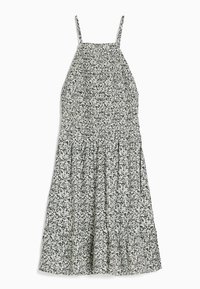 Sleeveless midi dress with thin straps, smocked bodice, and black floral pattern on white fabric.