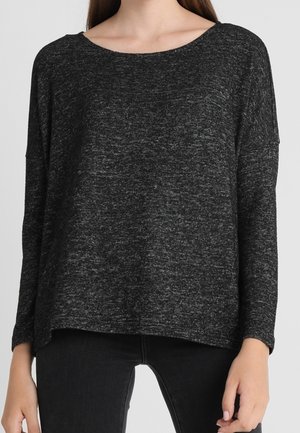 Schwarzes Strickoberteil mit rundem Ausschnitt, tiefen Schultern und lässiger Passform. Der Stoff hat ein strukturiertes, meliertes Finish. Minimalistisches Design.