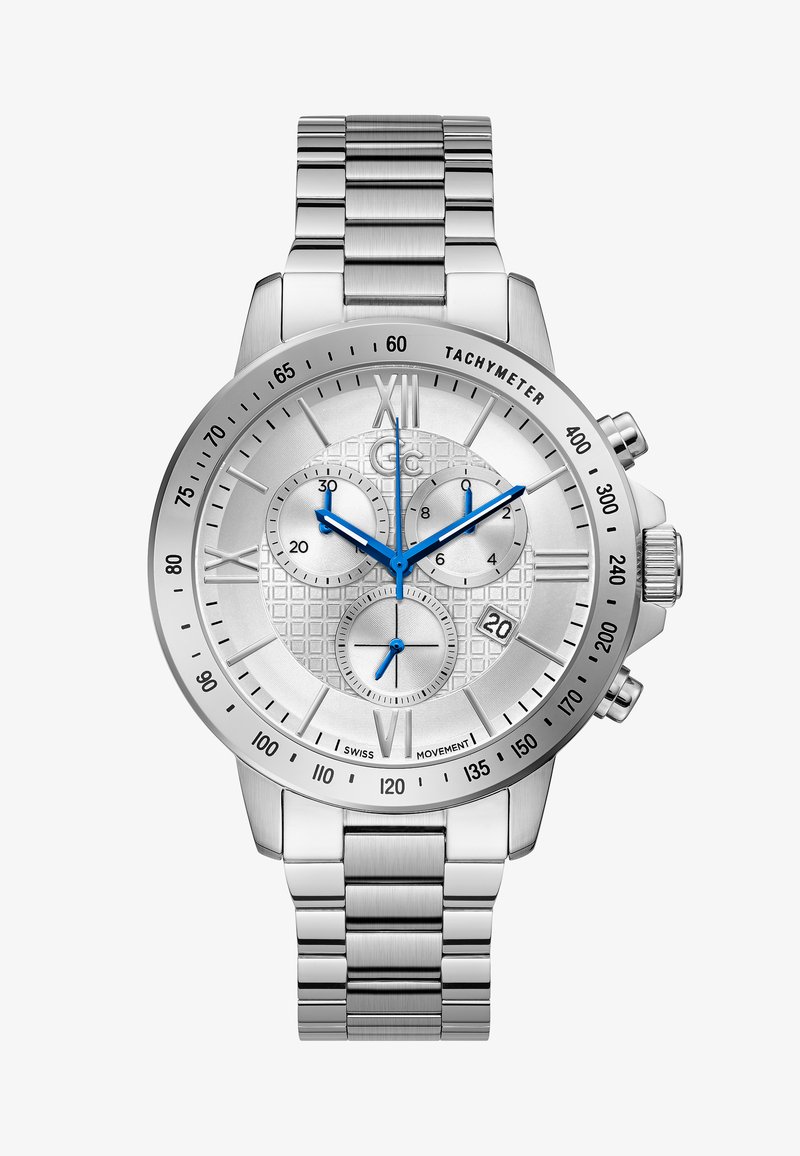 Sudraba nerūsējošā tērauda pulkstenis ar teksturētu gaiši pelēku ciparnīcu, zilām akcentiem, trim sub-dialiem, tachimetriskā mērogā un metāla aproci.