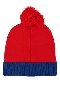 Red knit beanie with a blue ribbed cuff and a fluffy red pom-pom on top, featuring a smooth texture and rounded shape.