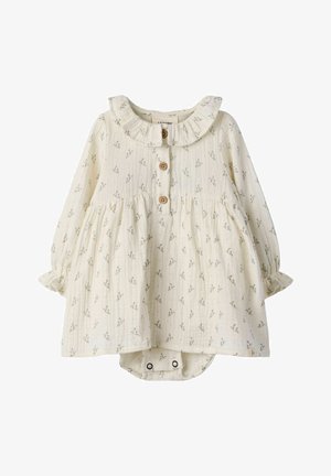 Cream baby dress with long sleeves, ruffled collar, wooden buttons down front, small floral print, and snap closures at bottom.