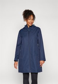 Laivyno mėlynumo nepralaidūs parkas su užtrauktuku, kapišonu ir dviem šoninėmis kišenėmis. Yra elastingos virvutės ir lygi matinė tekstūra.