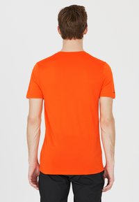 Endurance S/S PERFORMANCE - Sport T-shirt - scarlet ibis