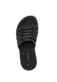 Sandales noires à glissière présentant un dessus en tissu texturé avec des sangles froncées, un semelle intérieure douce et une semelle plate en caoutchouc. Taille 37 indiquée sur la semelle.