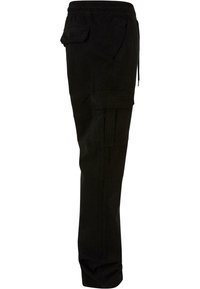 Pantalon cargo noir avec taille élastique, poches latérales et poches à rabat sur la cuisse et la hanche, présenté de profil.