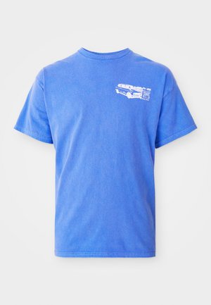 Blue cotton t-shirt with short sleeves, crew neck, featuring a white graphic of a vehicle on the left chest. Smooth texture.
