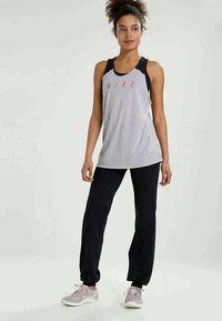 Casall PLOW - Träningsbyxor - black