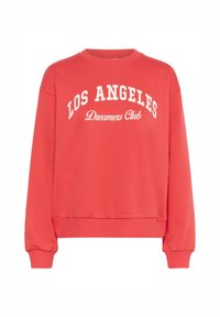 Sweatshirt corail avec un col rond, des manches longues et des poignets côtelés. Présente le texte blanc "LOS ANGELES Dreamers Club" sur le devant.