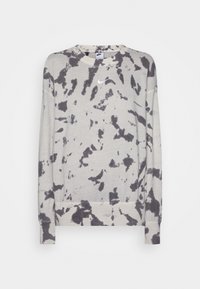 Sudadera de teñido anudado gris hecha de algodón. Presenta un cuello redondo, mangas largas y un pequeño logo blanco de Nike en el pecho. Textura suave.