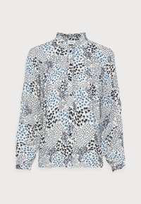 Blusa floreale bianca con motivi blu e neri. Collo a camicia, patta con bottoni e maniche lunghe con polsini arricciati. Tessuto morbido.
