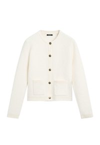 Cardigan color crema realizzato in tessuto testurizzato. Presenta un colletto rotondo, chiusura frontale con cinque bottoni e due tasche a toppa.