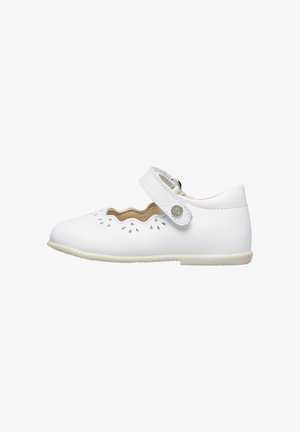 White leather Mary Jane shoe with scalloped detailing and perforated accents. Features a velcro strap and a light gray rubber sole.