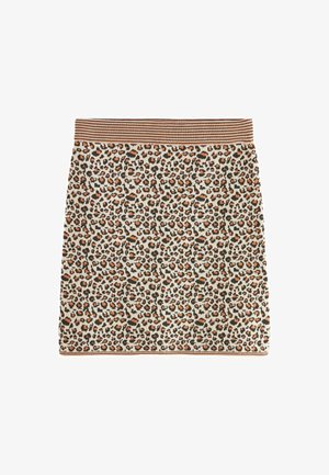 Spetskjol i leopardmönster med en ribbad brun midjeband. Har orange och svarta fläckar på en krämfärgad bakgrund, slät textur, knälång design.