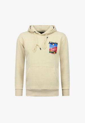 Beige hoodie met voorzak, trekkoorden en een kleurrijke Algerijnse stadslandschap-grafiek op de linkerborst.