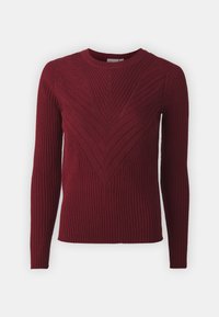 Burgundi ribbelt kötött pulóver hosszú ujjal, kerek nyakkivágással és csepp alakú mintázattal az elején. Simább felület, testhezálló fazon.