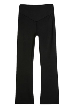 Leggings negros de campana con una cintura alta. Tejido suave y elástico con un diseño simple y líneas limpias, sin patrones o acentos visibles.