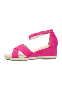 Sandalo con tacco a zeppa in suede rosa, con cinture incrociate, cinturino alla caviglia con fibbia in metallo e suola avvolta in corda di juta. Plantare morbido color beige.