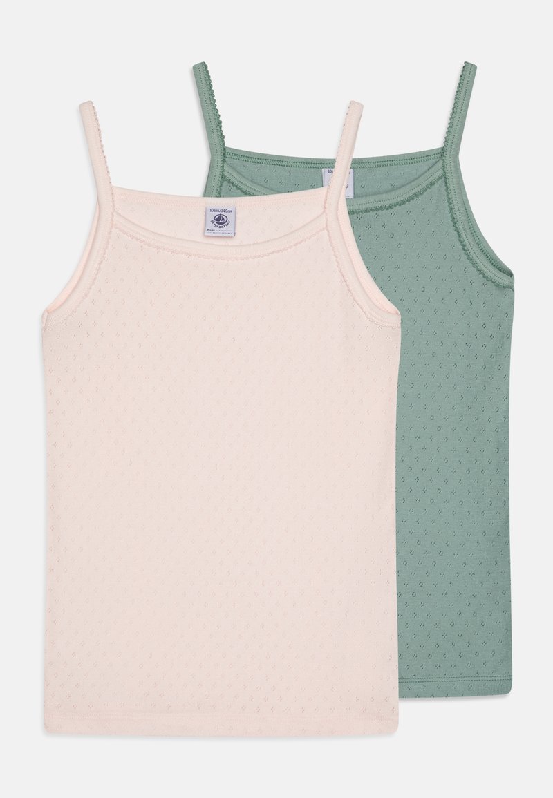 Two cotton tank tops in pink and green. Both feature thin straps, a textured pattern, and a simple, fitted design.