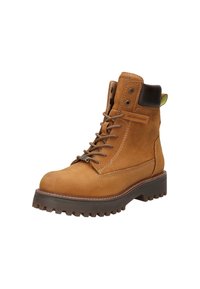 Braune Wildleder Schnürstiefel mit Gummisohle, runder Spitze, kontrastierenden braunen Lederakzenten und strukturiertem Obermaterial. Verfügt über Metallösen und Nähte.