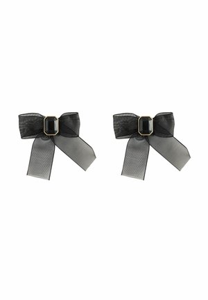 Schwarze transparente Haarbänder mit einer zentralen schwarzen Schmuckverzierung, die lange herabhängende Enden und eine zarte Textur aufweisen.