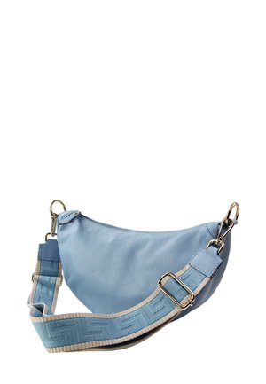 Blue leather bag with a crescent shape, featuring a textured strap with geometric patterns and metallic hardware accents.