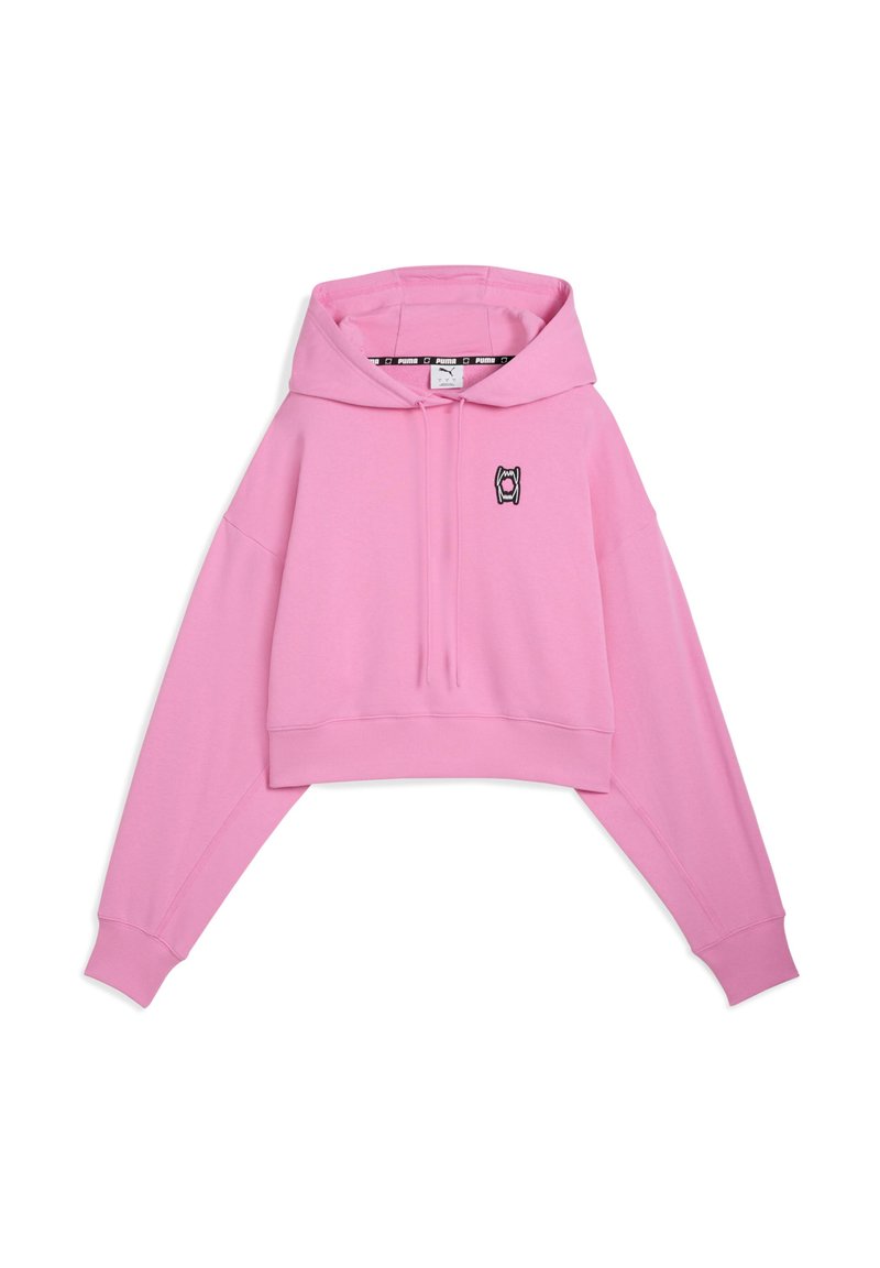 Pink cropped hoodie with a drawstring, oversized fit, and long sleeves. Front features a black logo on the left side. Soft fabric texture.