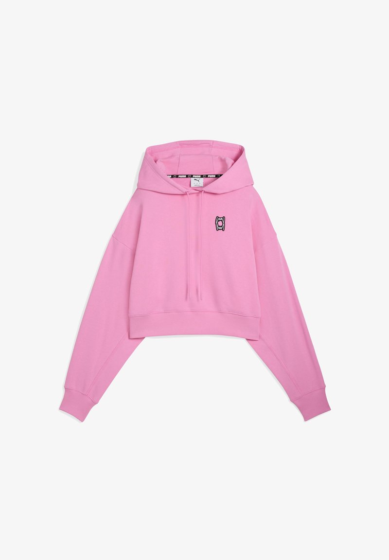 Pink cropped hoodie with a drawstring, oversized fit, and long sleeves. Front features a black logo on the left side. Soft fabric texture.