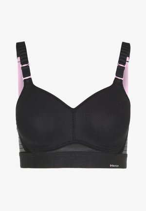 Črna športna modrček z oblikovanimi skodelicami, mrežasto teksturo, nastavljivimi naramnicami in roza detajli. Ima širok podpasnik z logotipom.