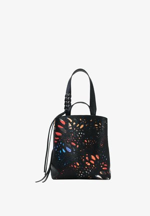 Sac à main en cuir noir avec une grande anse et une bandoulière, présentant des motifs découpés floraux multicolores et un détail de gland en cuir.