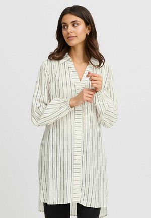 Long, button-up shirt in light fabric with vertical black stripes and a collared neckline. Features long sleeves and a slight A-line shape.