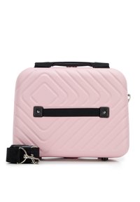 Pink hard-shell suitcase with diagonal ridges, black accent strap, and removable shoulder strap. Features a top handle for easy carrying.