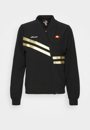 Sort bomberjakke med lynlås og guld diagonale striber, ellesse-logo på venstre bryst samt ribbede manchetter og kant.