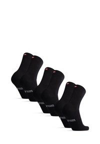 Chaussettes en coton noir, avec texture côtelée, surface lisse, longueur mi-mollet et détail de logo sur le côté. Paquet de cinq paires.