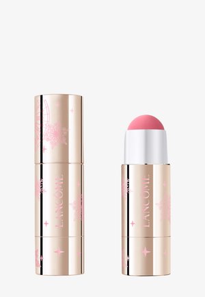 Crayon blush crème Lancome avec un capuchon cylindrique doré, orné de motifs floraux roses et une pointe applicatrice arrondie rose.