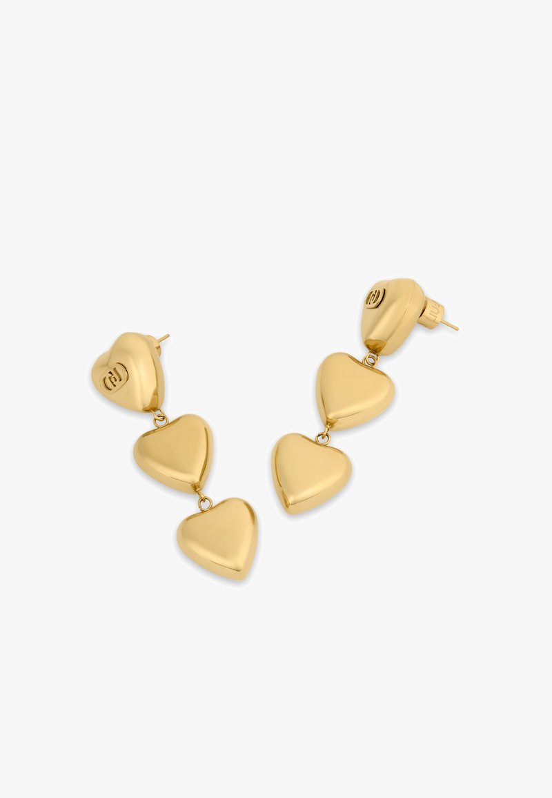 Gold-tone earrings with a heart design, featuring three interconnected heart shapes and a stud back. Smooth, polished surface.