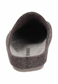Brown felt slipper, open at the front, with a soft texture. The insole is light grey, with a visible brand name printed inside.