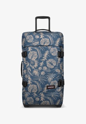 Rullattava matkalaukku sinisellä kukkakuviolla, valmistettu kestävästä kankaasta. Siinä on vedettävä kahva ja säädettävät hihnat sivuilla.