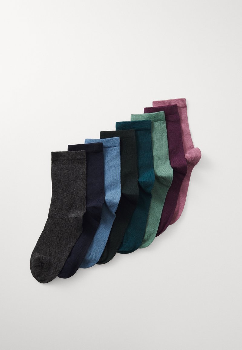 Set of eight socks in various colors: dark gray, navy, light blue, dark green, teal, purple, and light pink. Made from a soft, textured fabric.
