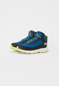 Chaussures de randonnée bleu et noir avec une tige en mesh, accents jaunes et semelles en caoutchouc texturé. Comprend des lacets durables et des détails de logo.