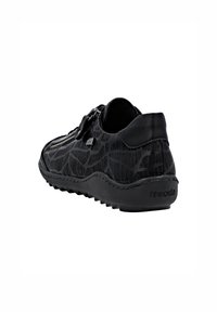 Baskets noires avec tige texturée présentant un motif subtil, forme arrondie, fermeture éclair et semelle en caoutchouc nervurée. Marque sur le talon.